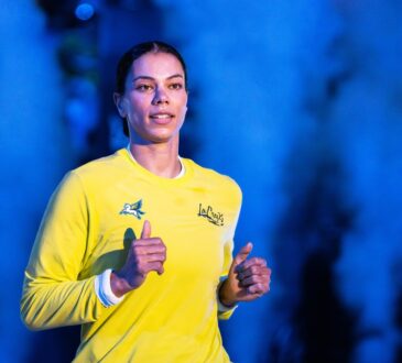 Veteran forward Alysha Clark of the Dallas Wings running through pre-game warmups before facing the Atlanta Dream.