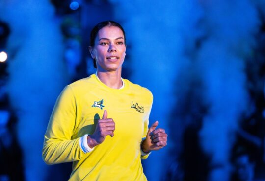 Veteran forward Alysha Clark of the Dallas Wings running through pre-game warmups before facing the Atlanta Dream.