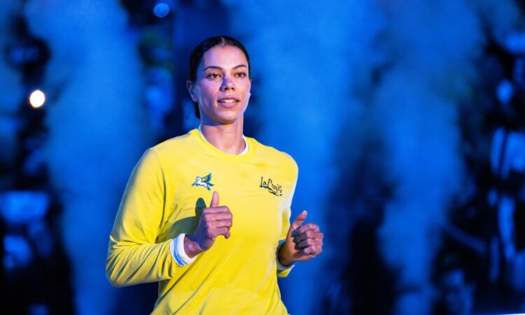 Veteran forward Alysha Clark of the Dallas Wings running through pre-game warmups before facing the Atlanta Dream.