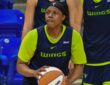 Arike Ogunbowale handles the ball during a 5-on-5 drill at Dallas Wings practice.