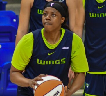 Arike Ogunbowale handles the ball during a 5-on-5 drill at Dallas Wings practice.