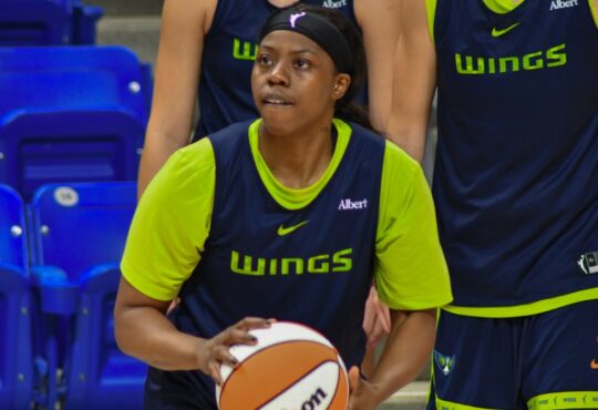 Arike Ogunbowale handles the ball during a 5-on-5 drill at Dallas Wings practice.