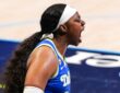 Arike Ogunbowale of the Dallas Wings roaring toward the sellout crowd at College Park Center during the home opener.