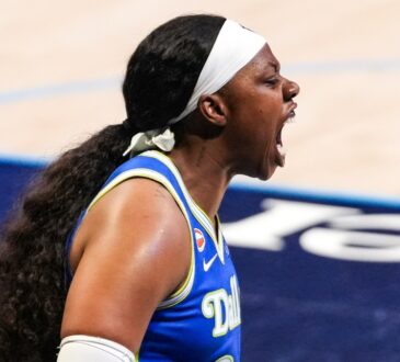 Arike Ogunbowale of the Dallas Wings roaring toward the sellout crowd at College Park Center during the home opener.