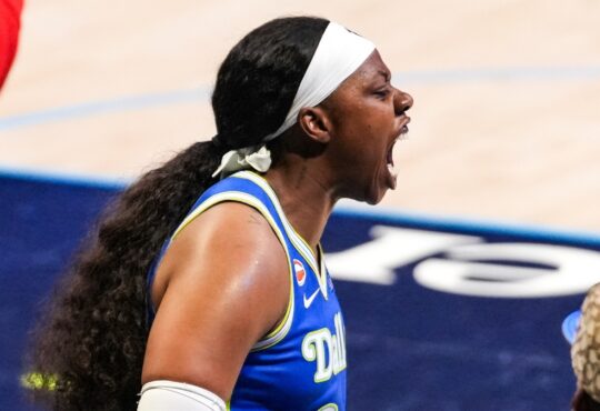 Arike Ogunbowale of the Dallas Wings roaring toward the sellout crowd at College Park Center during the home opener.