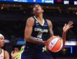 Aziaha James (10) of the Dallas Wings goes up for a shot against the Indiana Fever.