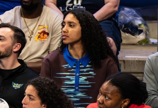 Dallas Wings rookie Azzi Fudd watching from the bench during the 2026 home opener against the Atlanta Dream.