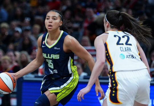 Dallas Wings guard Azzi Fudd (No. 35) drives to the basket against Indiana Fever guard Caitlin Clark (No. 22) during the 2026 preseason opener.