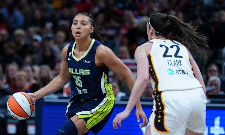 Dallas Wings guard Azzi Fudd (No. 35) drives to the basket against Indiana Fever guard Caitlin Clark (No. 22) during the 2026 preseason opener.