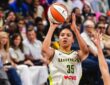Dallas Wings rookie Azzi Fudd rising for a jump shot against the Minnesota Lynx during her home debut at College Park Center.