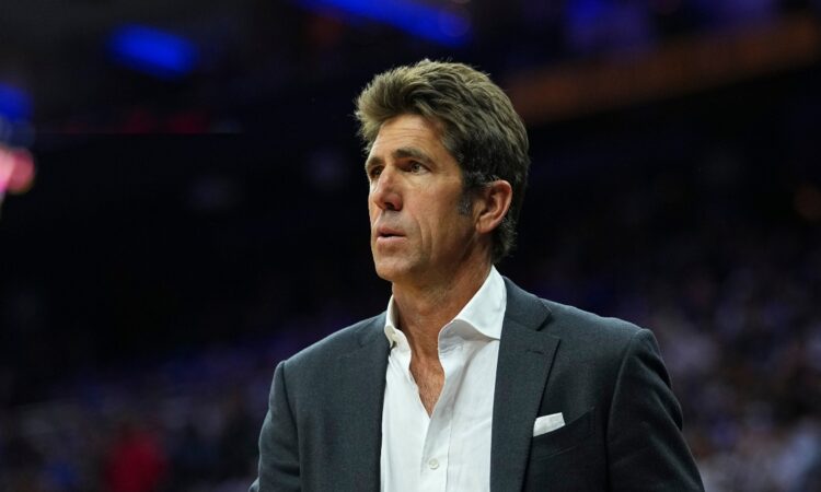 Bob Myers watching the Eastern Conference first round playoff game between the Boston Celtics and Philadelphia 76ers at Xfinity Mobile Arena.