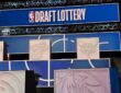 Rolando Blackman of the Dallas Mavericks on stage at the 2026 NBA Draft Lottery in Chicago.