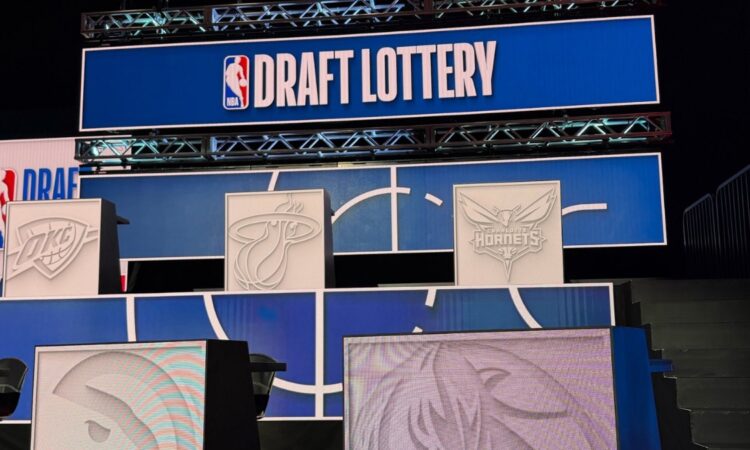 Rolando Blackman of the Dallas Mavericks on stage at the 2026 NBA Draft Lottery in Chicago.