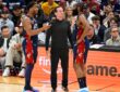 Donovan Mitchell and head coach Kenny Atkinson talk to James Harden during Game 1 of the Eastern Conference First Round NBA Playoffs at Rocket Arena.