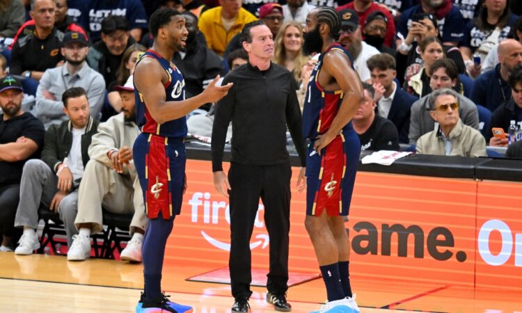 Donovan Mitchell and head coach Kenny Atkinson talk to James Harden during Game 1 of the Eastern Conference First Round NBA Playoffs at Rocket Arena.