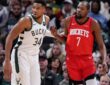 Giannis Antetokounmpo #34 of the Milwaukee Bucks defends Kevin Durant #7 of the Houston Rockets during a game at Fiserv Forum.