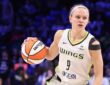 Grace Berger of the Dallas Wings handles the ball during a WNBA game against the Phoenix Mercury at College Park Center.