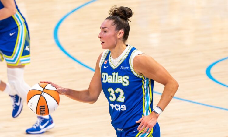 Dallas Wings forward Jessica Shepard dribbles the ball against the Atlanta Dream at College Park Center.