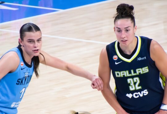Jessica Shepard pivoting in the high post as Sky guard Gabriela Jaquez fights over an interior screen to contest the play.