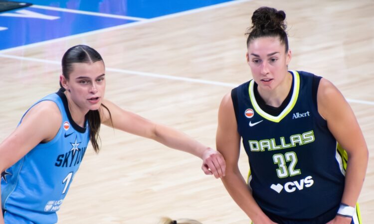Jessica Shepard pivoting in the high post as Sky guard Gabriela Jaquez fights over an interior screen to contest the play.