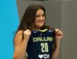Maddy Siegrist of the Dallas Wings posing in her home jersey during 2026 Media Day.