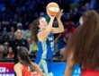 Maddy Siegrist elevating out of a hard cut to catch and shoot a jumper over a closing Washington defender.