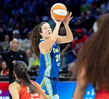 Maddy Siegrist elevating out of a hard cut to catch and shoot a jumper over a closing Washington defender.