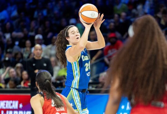 Maddy Siegrist elevating out of a hard cut to catch and shoot a jumper over a closing Washington defender.