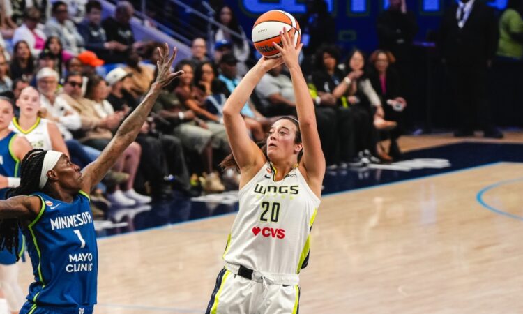 Maddy Siegrist of the Dallas Wings rising for a jump shot during a career-best scoring performance against the Minnesota Lynx.