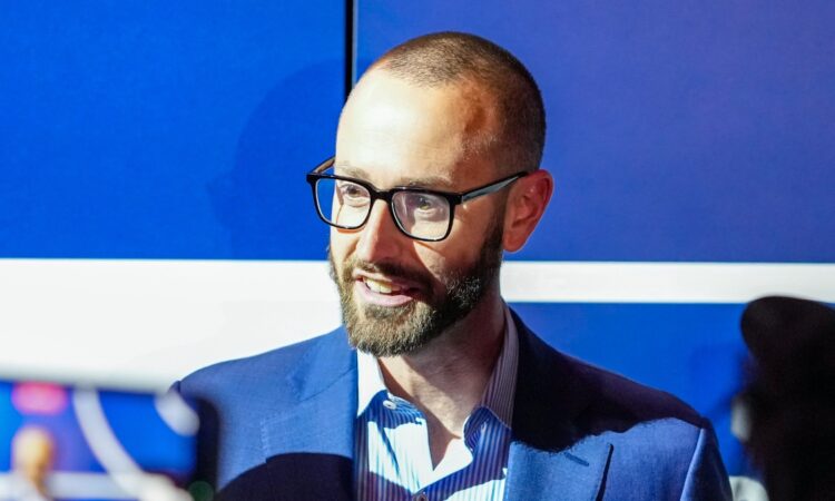 Dallas Mavericks general manager Mike Schmitz speaking to reporters at the 2026 NBA Draft Lottery in Chicago