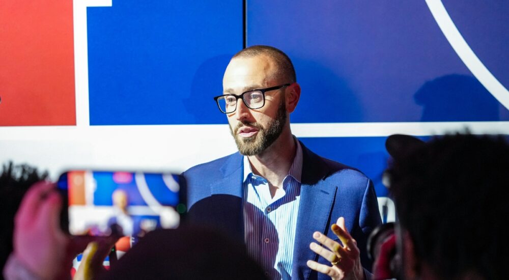 New Dallas Mavericks General Manager Mike Schmitz speaking to reporters after the 2026 NBA Draft Lottery in Chicago.