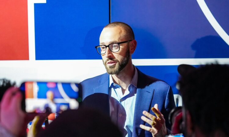 New Dallas Mavericks General Manager Mike Schmitz speaking to reporters after the 2026 NBA Draft Lottery in Chicago.