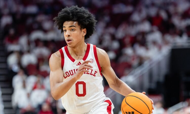 Louisville freshman point guard Mikel Brown Jr. handling the ball along the perimeter against NC State at the KFC Yum! Center.