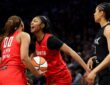 Naz Hillmon (00) of the Atlanta Dream celebrates with Angel Reese (5) during the fourth quarter against the Minnesota Lynx at Target Center.