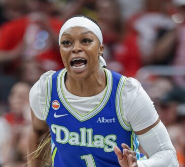 Odyssey Sims (1) of the Dallas Wings reacts during the first half against the Indiana Fever at Gainbridge Fieldhouse.