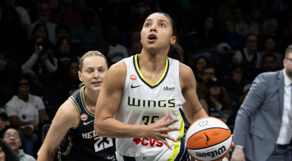 Guard Paige Bueckers and rookie guard Azzi Fudd running the floor together during a fast-break transition sequence at Barclays Center.