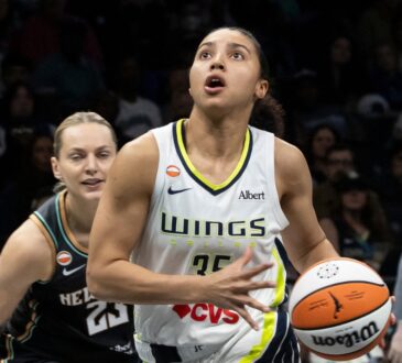 Guard Paige Bueckers and rookie guard Azzi Fudd running the floor together during a fast-break transition sequence at Barclays Center.