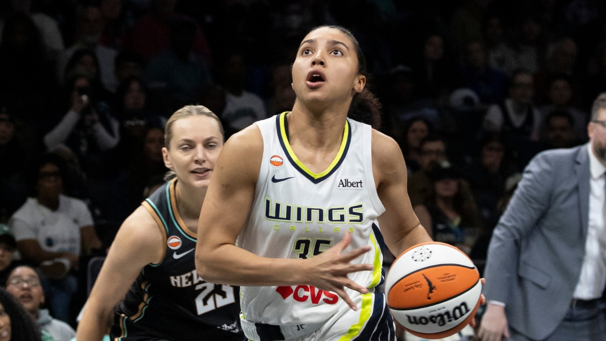 Guard Paige Bueckers and rookie guard Azzi Fudd running the floor together during a fast-break transition sequence at Barclays Center.