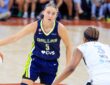 Paige Bueckers of the Dallas Wings dribbles the ball past NaLyssa Smith of the Las Vegas Aces during a preseason game at the Moody Center in Austin.