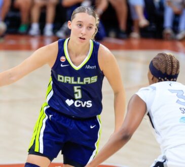 Paige Bueckers of the Dallas Wings dribbles the ball past NaLyssa Smith of the Las Vegas Aces during a preseason game at the Moody Center in Austin.