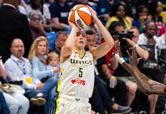 Paige Bueckers of the Dallas Wings rising for a jump shot against the Minnesota Lynx at College Park Center.