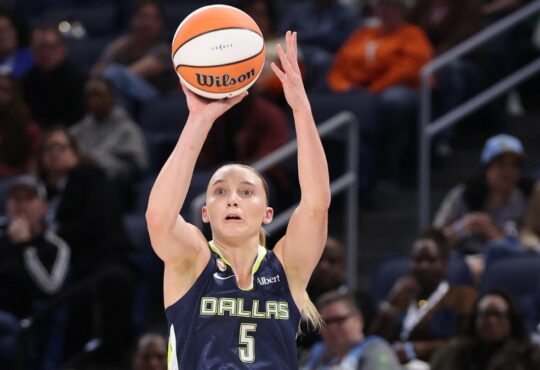 Guard Paige Bueckers elevating for a mid-range jump shot during the first half against the Chicago Sky.