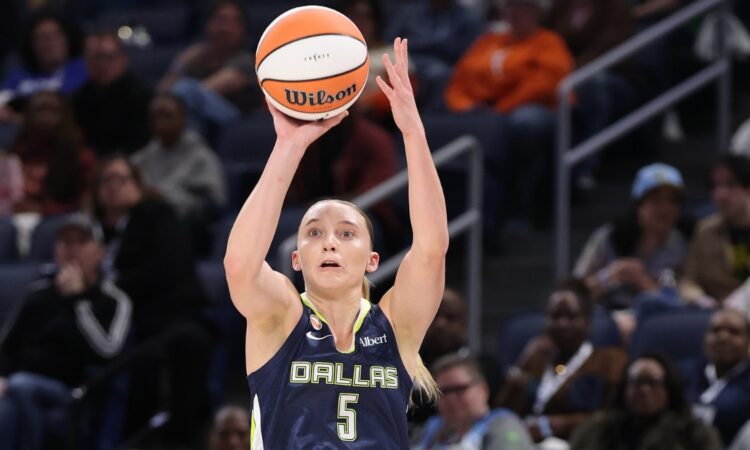 Guard Paige Bueckers elevating for a mid-range jump shot during the first half against the Chicago Sky.