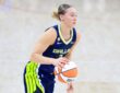 Paige Bueckers (5) of the Dallas Wings dribbles the ball up the court against the Las Vegas Aces.