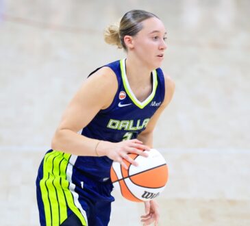 Paige Bueckers (5) of the Dallas Wings dribbles the ball up the court against the Las Vegas Aces.