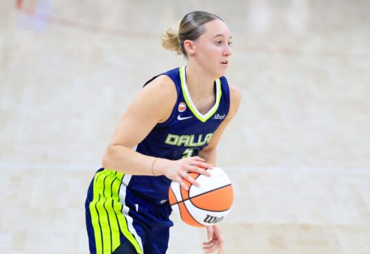 Paige Bueckers (5) of the Dallas Wings dribbles the ball up the court against the Las Vegas Aces.