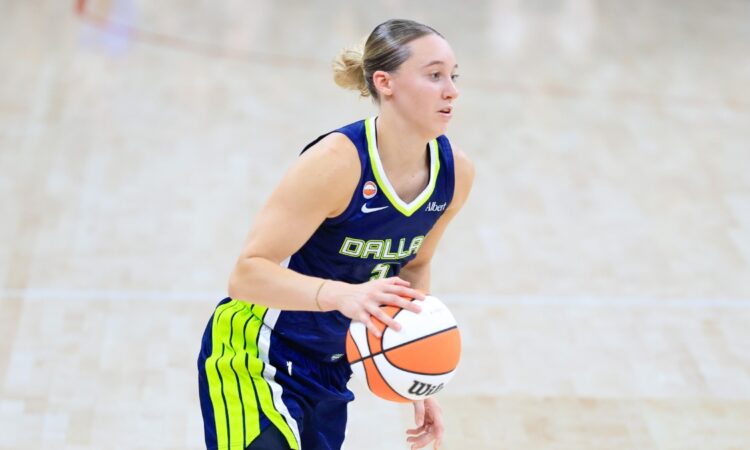 Paige Bueckers (5) of the Dallas Wings dribbles the ball up the court against the Las Vegas Aces.
