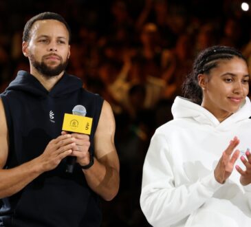 NBA star Stephen Curry and WNBA rookie Azzi Fudd standing together on the court during the 2025 Curry Camp opening training session in Chongqing, China.
