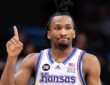 Darryn Peterson holds up one finger while playing for Kansas ahead of the 2026 NBA Draft