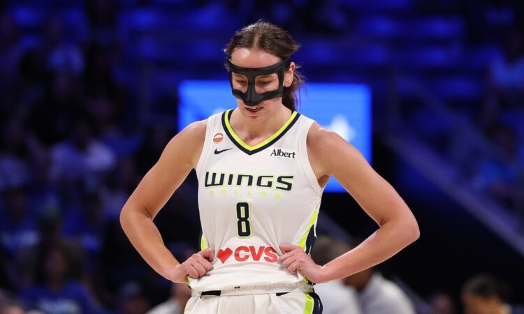 Dallas Wings forward Alanna Smith walking backcourt during a game against the Minnesota Lynx at College Park Center.